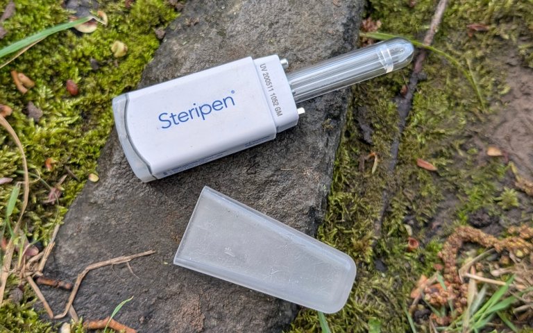 Steripen on a rock and moss