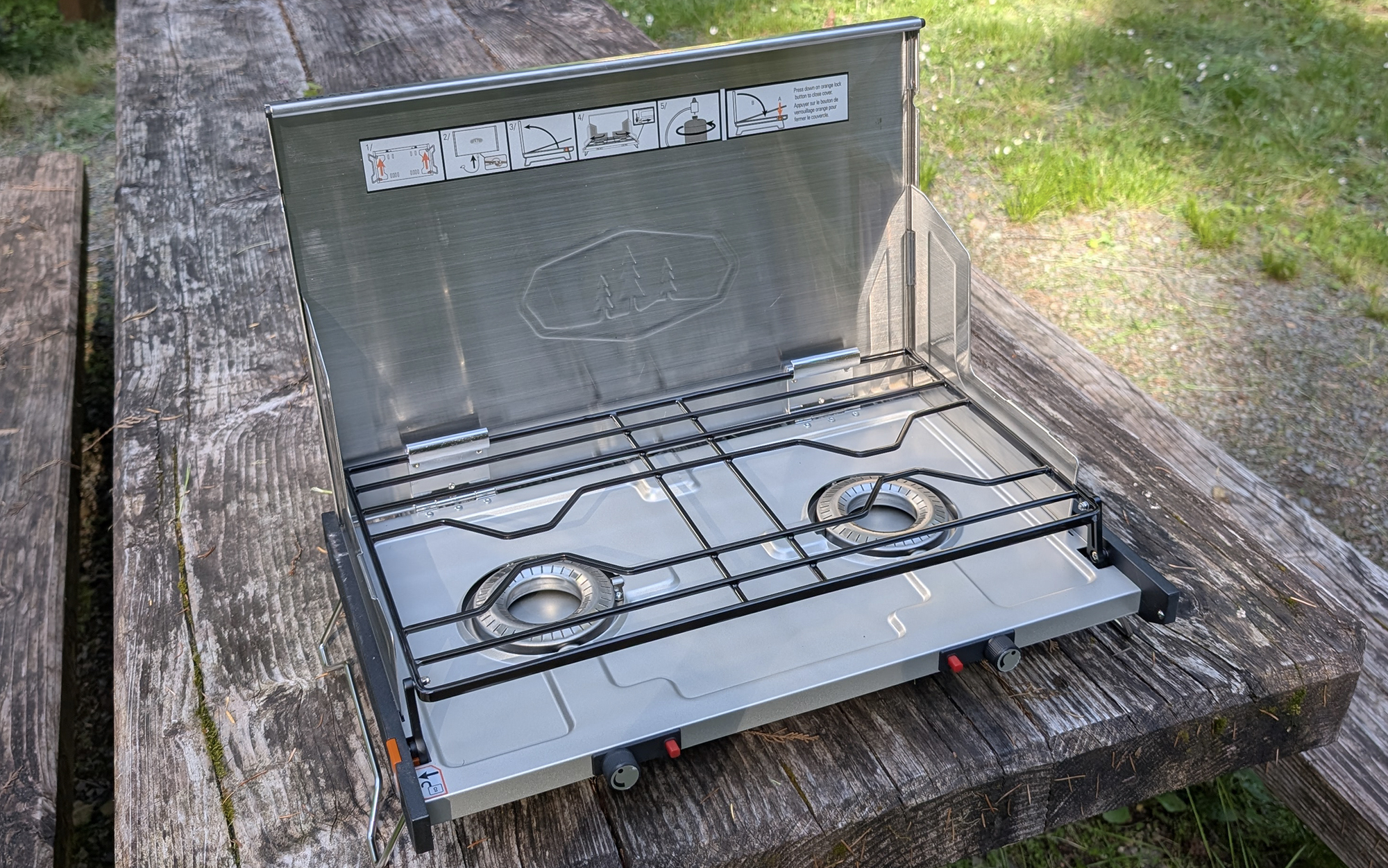 GSI Pinnacle camping stove sitting on a camping table