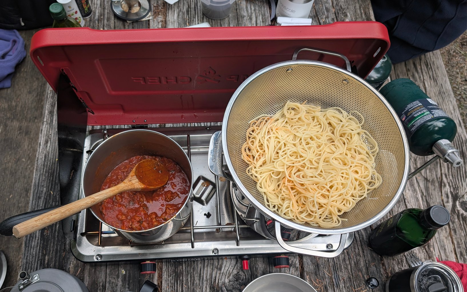 pasta and pasta sauce that was just cooked on one of the best camping stoves