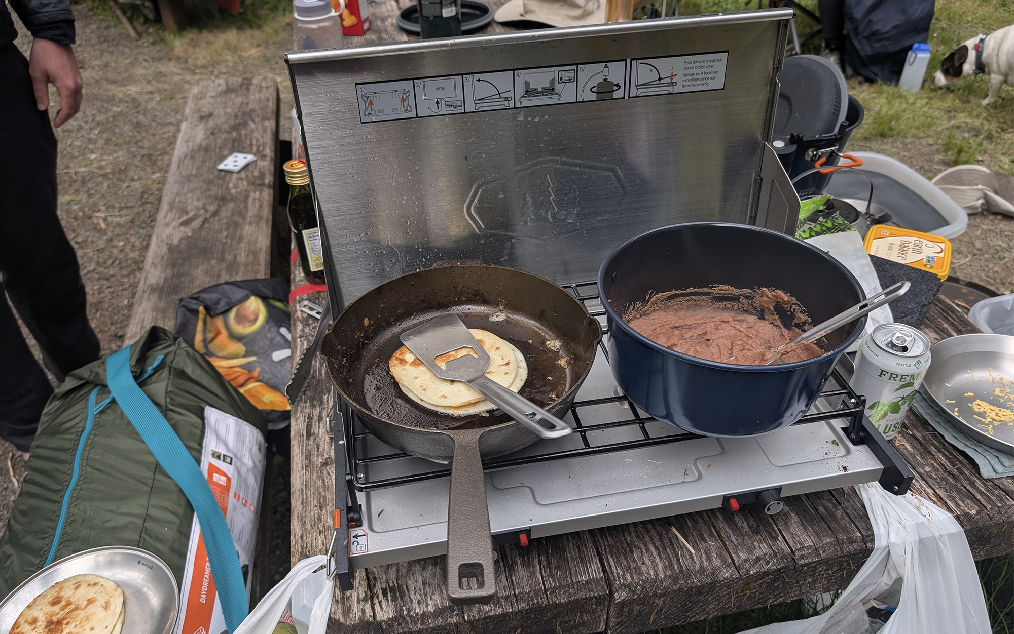 Cooking refried beans and mini quesadillas on the GSI Pinnacle