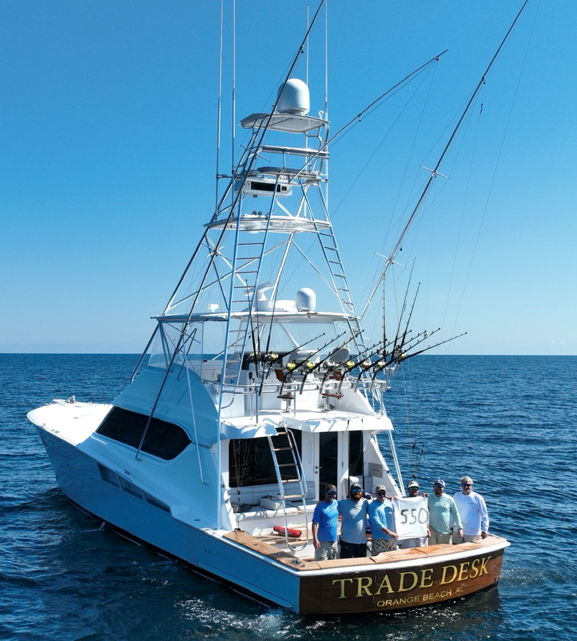 A crew of anglers aboard a sportfishing yacht in the Gulf.