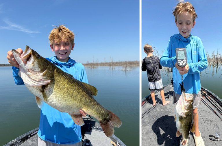 A young angler holds up a double-digit largemouth bass.