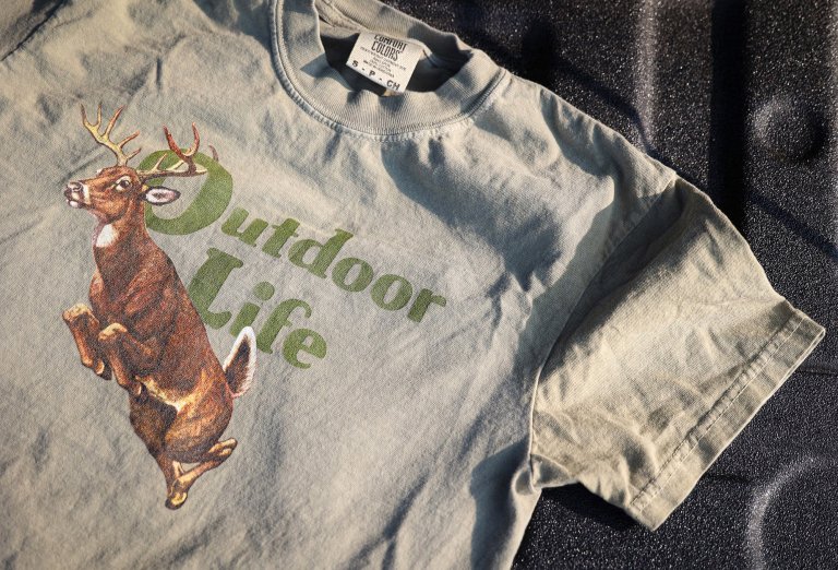 An Outdoor Life t-shirt of a big buck on a vintage logo