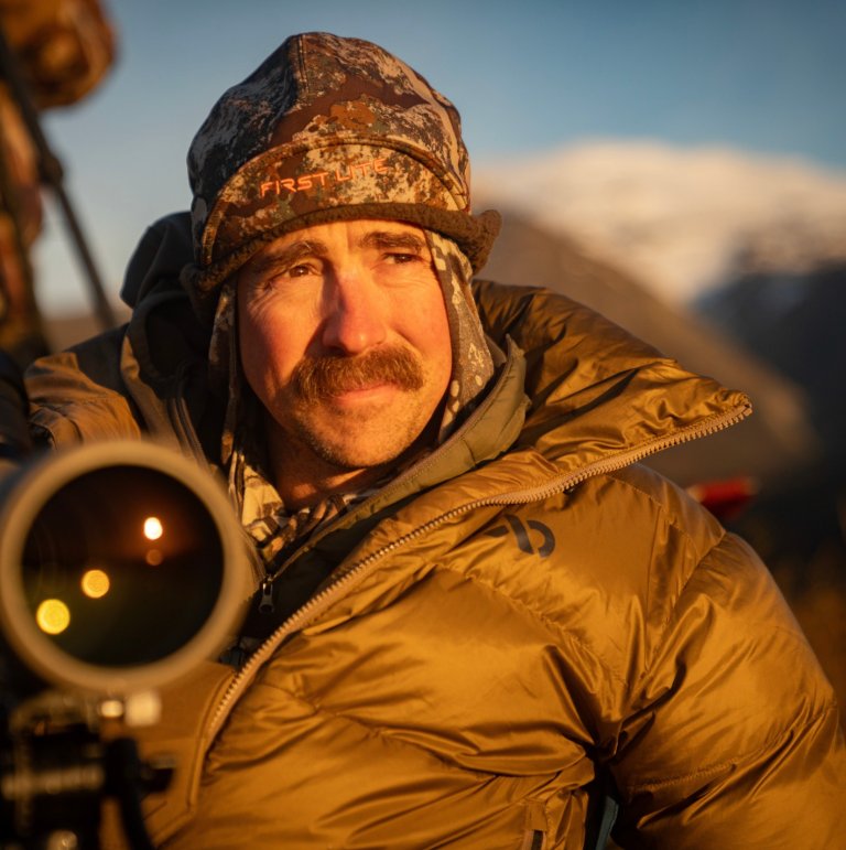 Ryan Callaghan behind a spotting scope