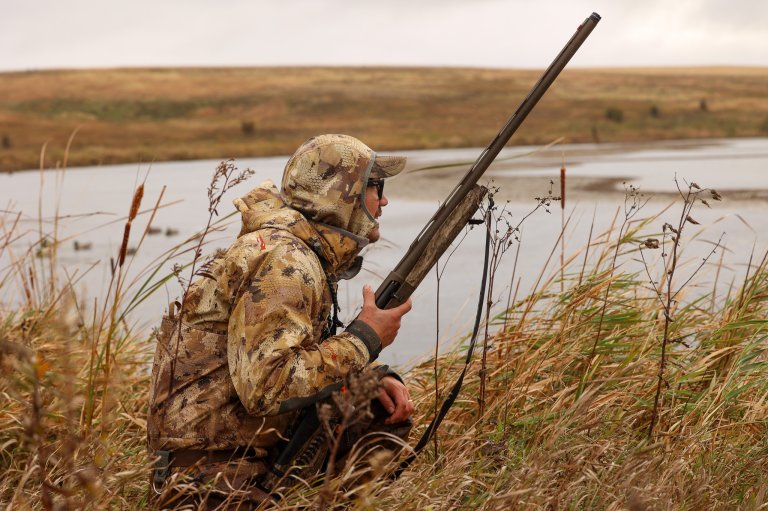 A duck hunter in sitka camo