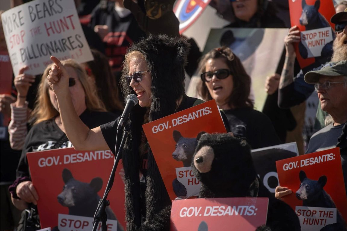 A protester speaks out against bear hunting during a rally.