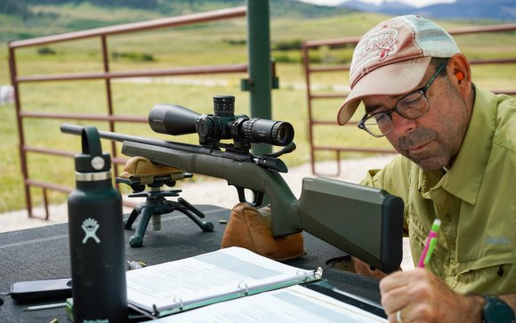 The author fills out a test evaluation form at the 2025 Optics Test