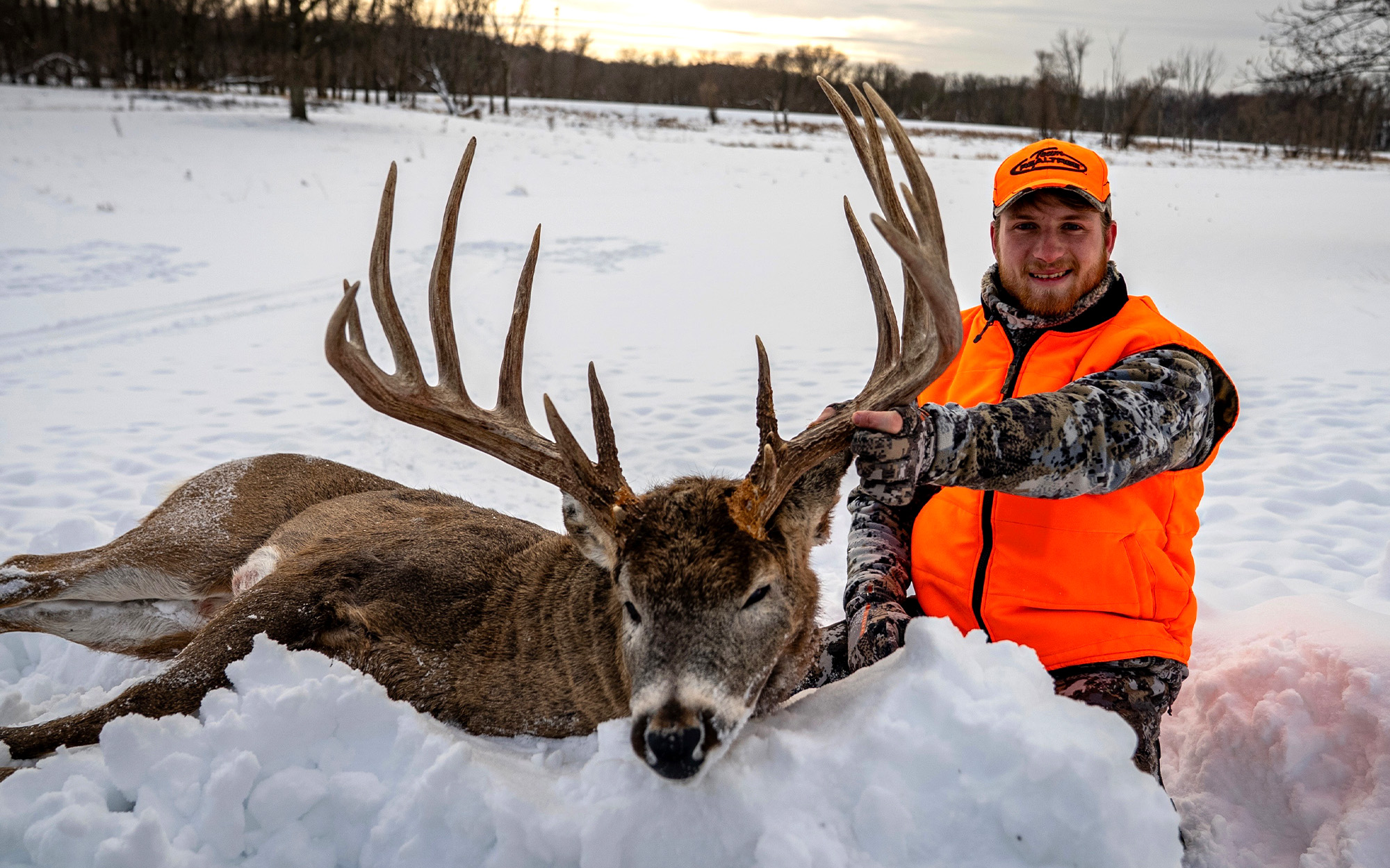 A Wisconsin hunter and a huge typical buck.