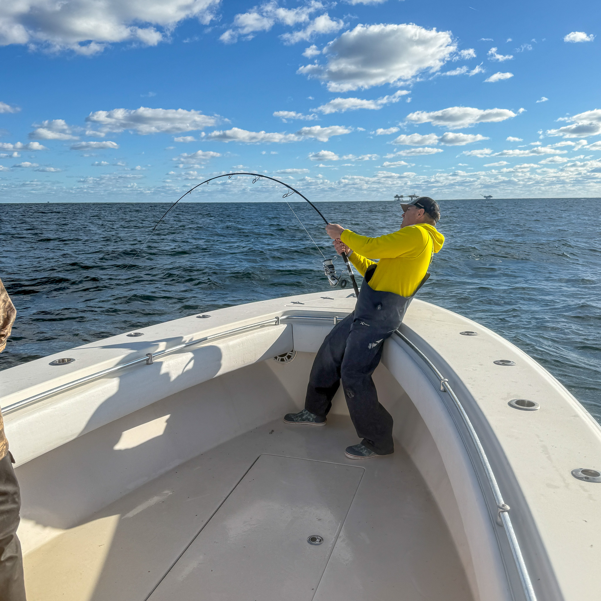 A fisherman hooks up with the Louisiana state record yellowfin