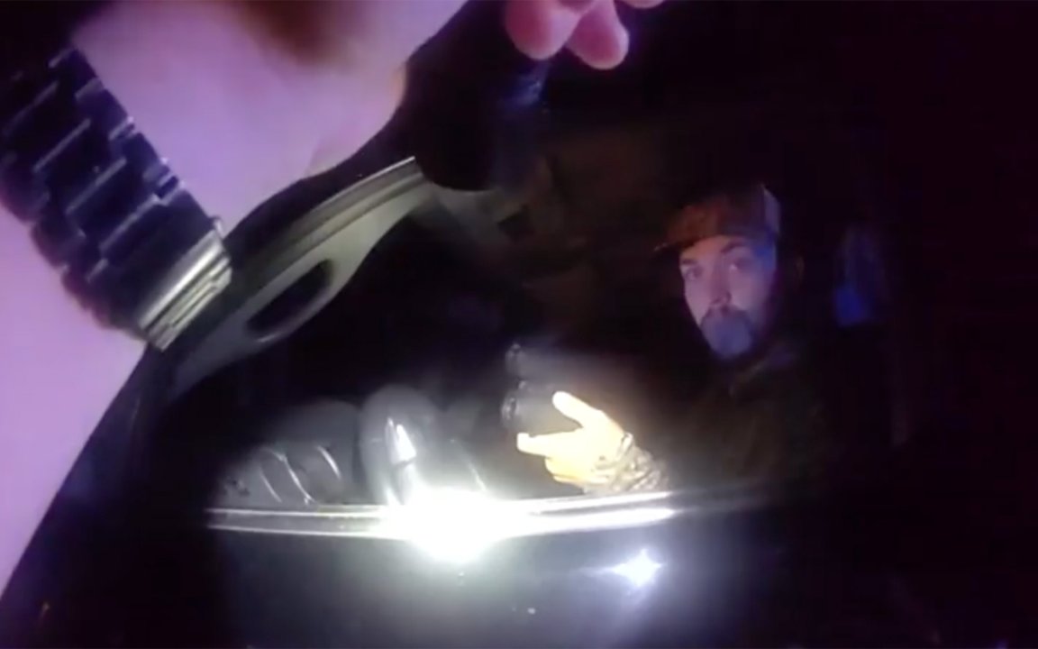 A screenshot from body cam footage of a hunter being arrested in South Carolina.