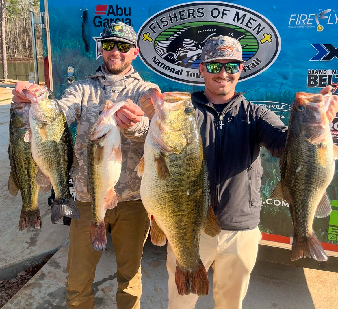 Two anglers with bass