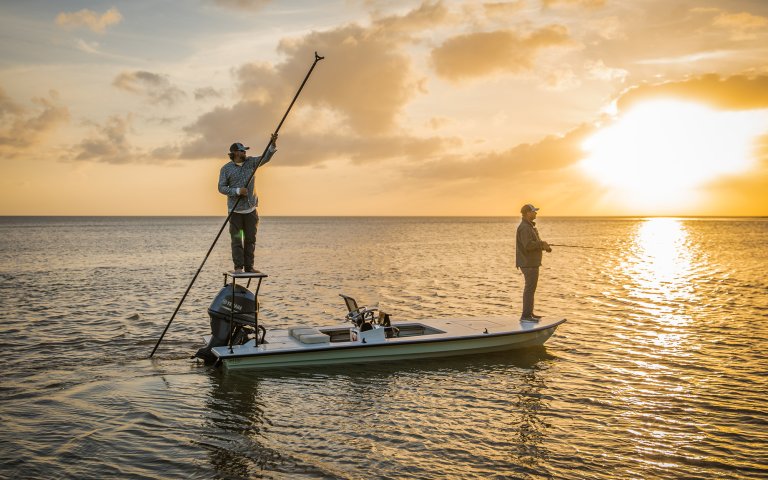 Two anglers on a flats boat in Florida.