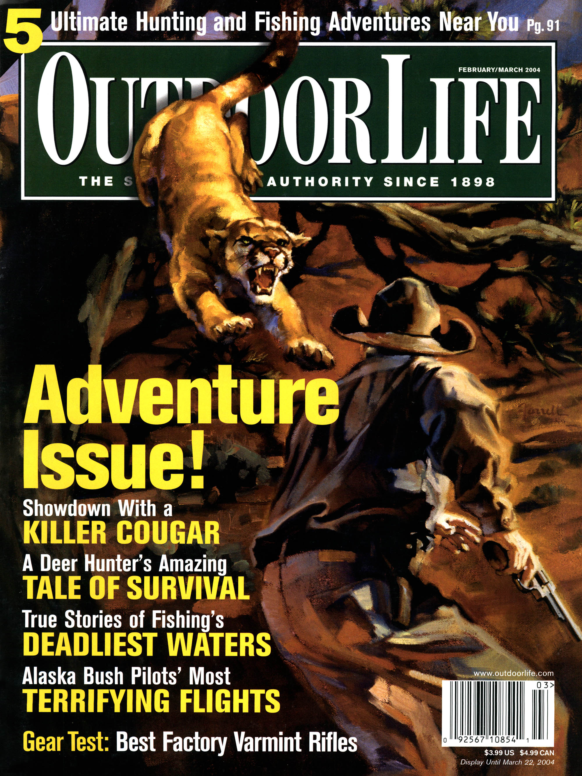 An old outdoor life cover from jan 2004 featuring a hunter being charged by a cougar.