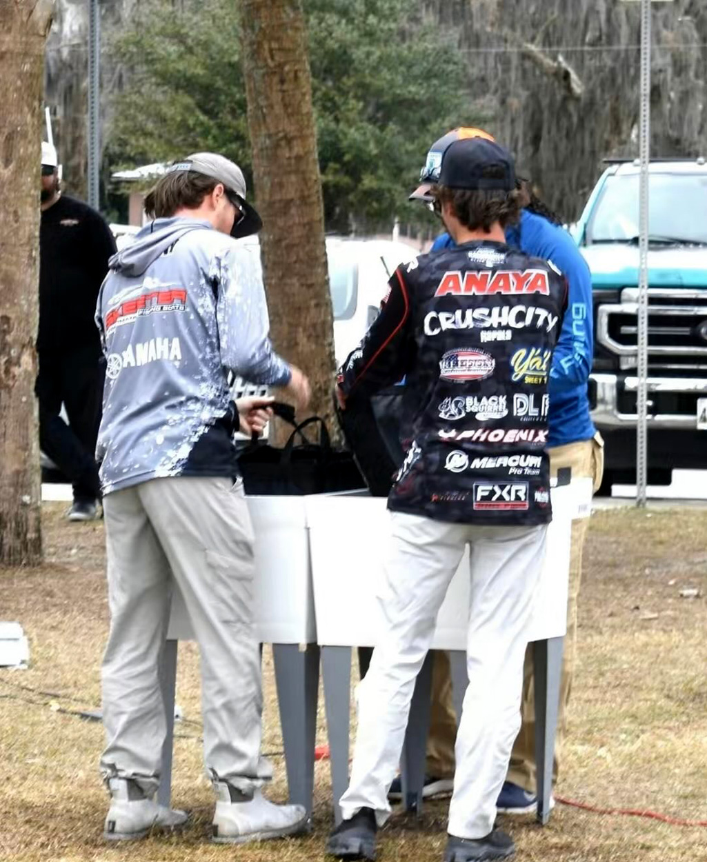 Anglers at the weigh-in at a bass tournament.