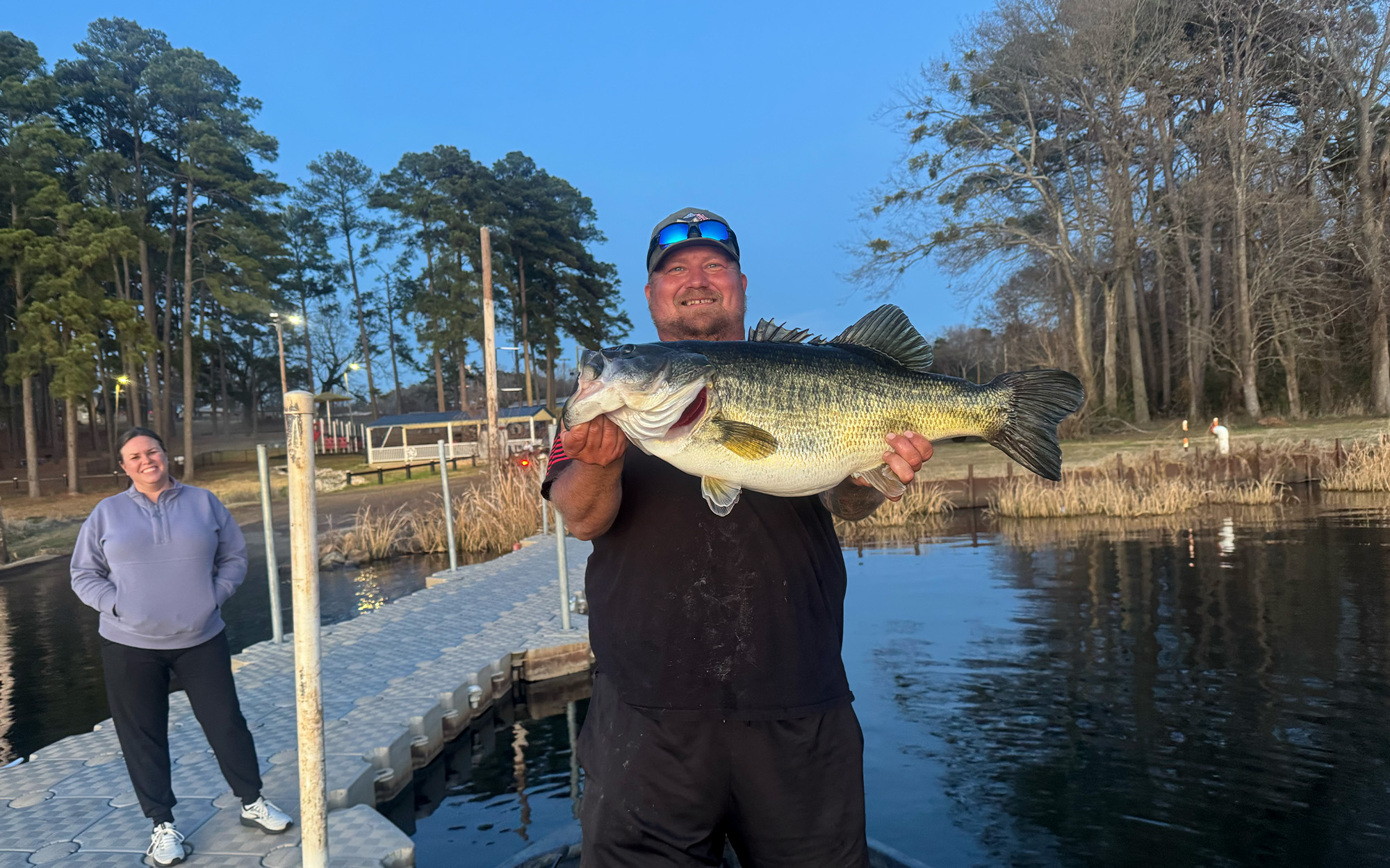 A Texas fisherman holds up a huge bass.