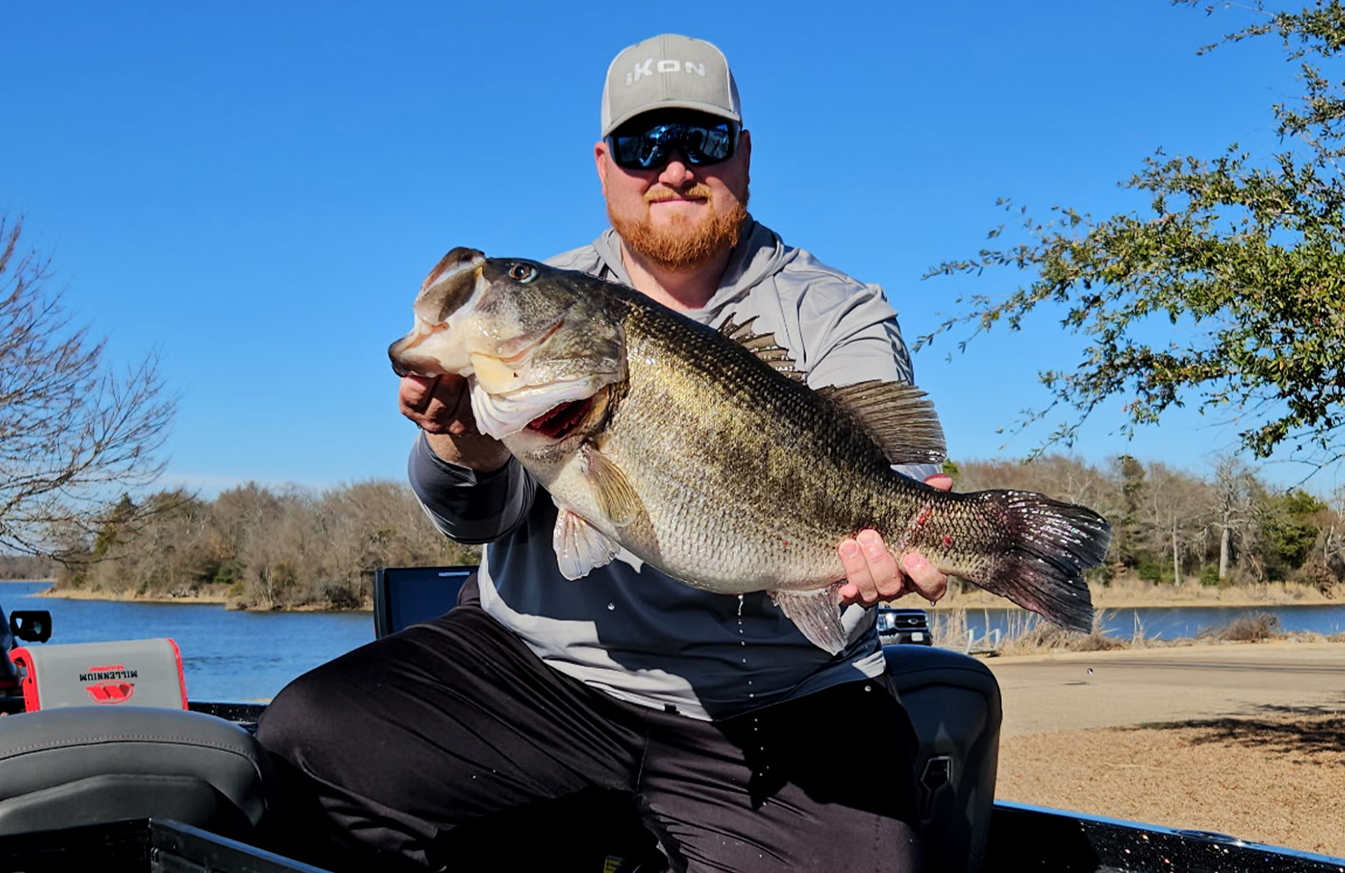 Guide Catches a Monster 16-Pound Bass While Giving His Client a