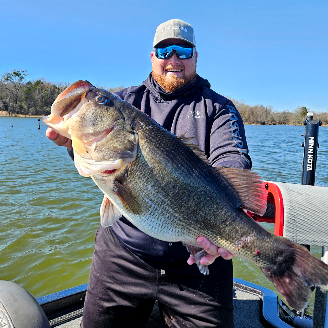 Guide Catches a Monster 16-Pound Bass While Giving His Client a