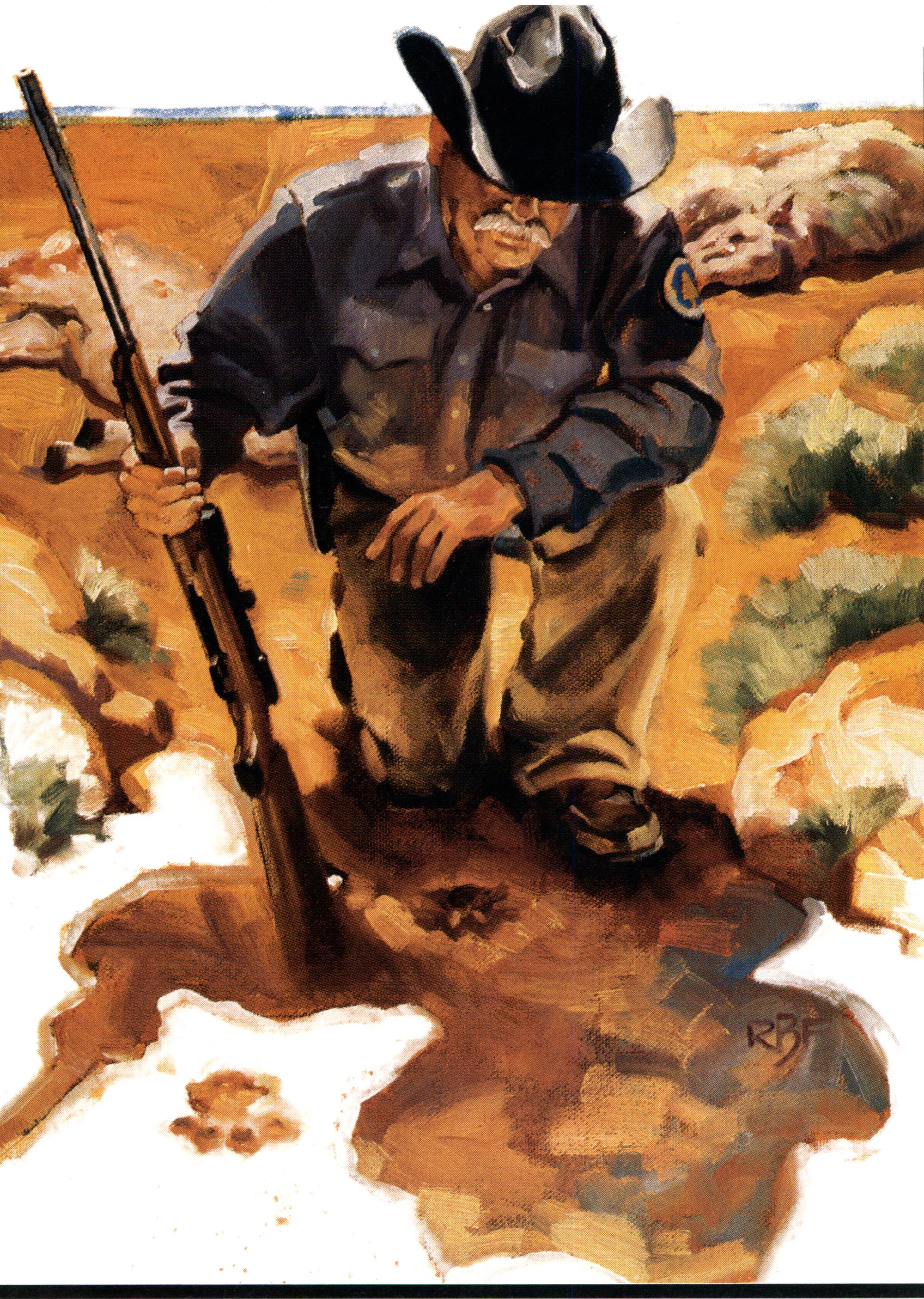 A state predator hunter kneels beside a lion track with his rifle