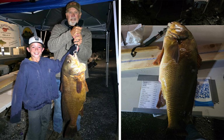A young angler and his grandpa with a state-record drum.