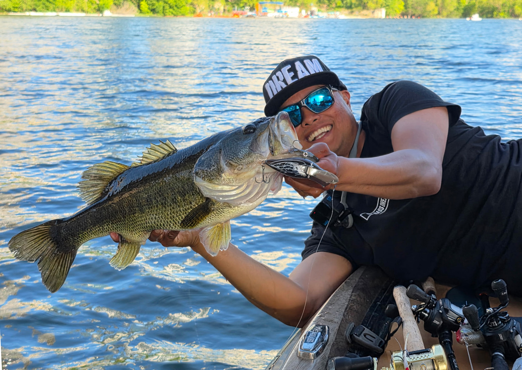 Oliver Ngy with a giant bass.