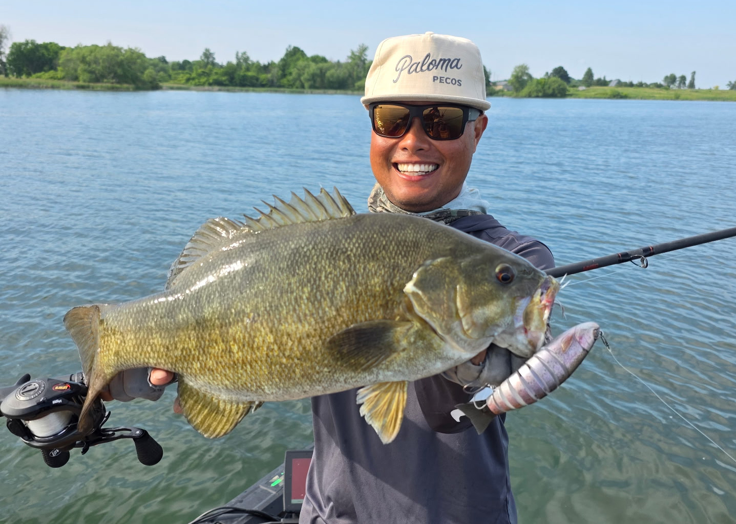Oliver Ngy with a nice bass caught on a multi-joint bait.