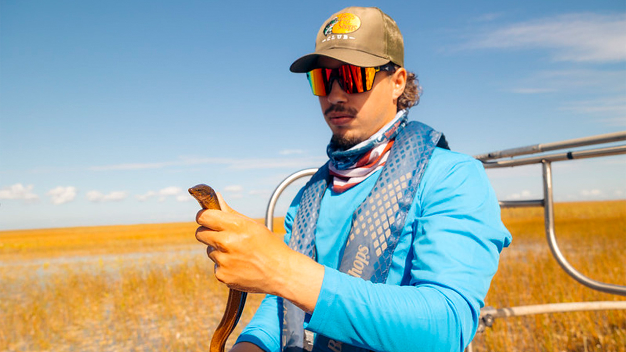 A scientist holds an Asian swamp eel.