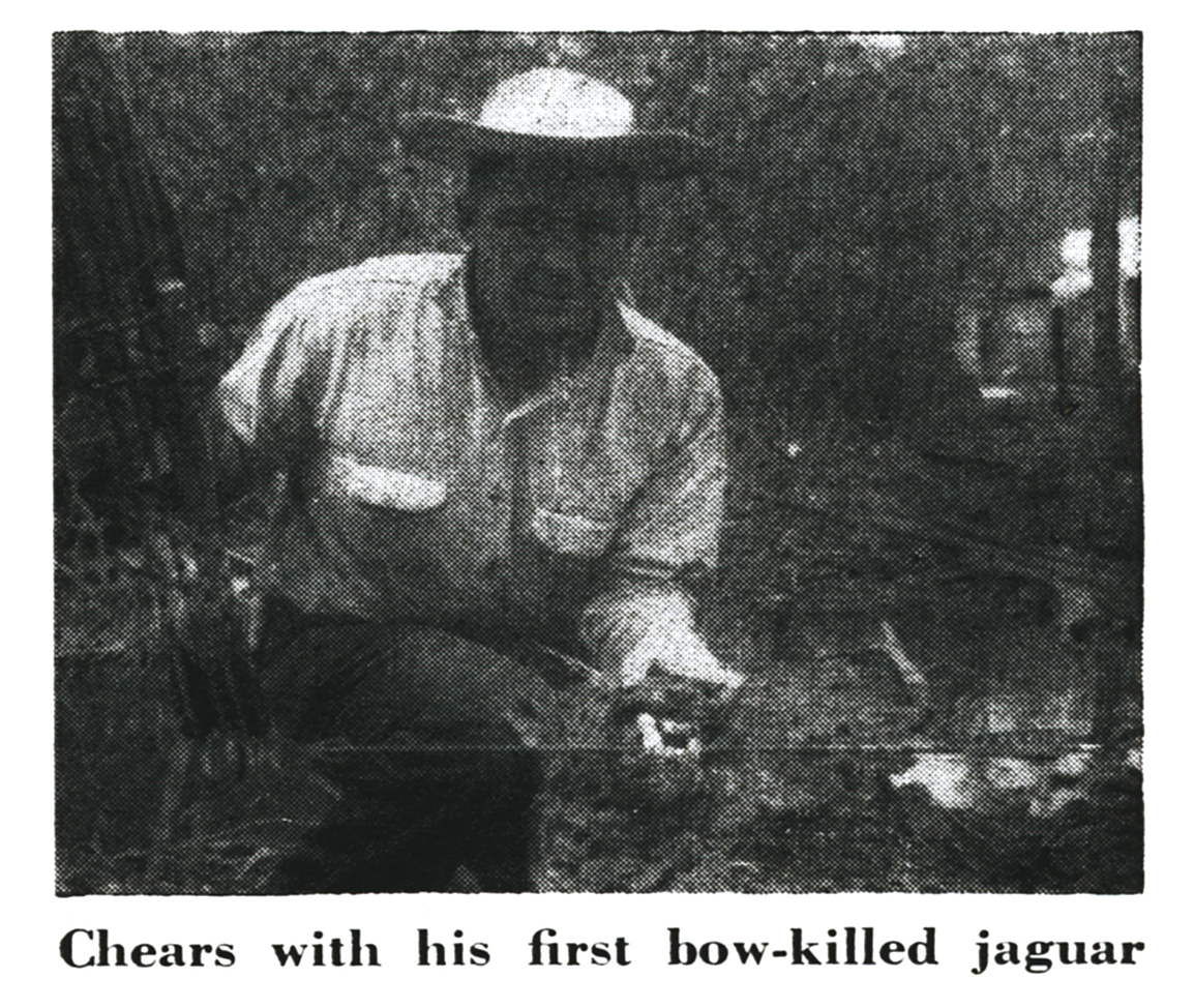 An old black and white photo of delbert chears with a jaguar.
