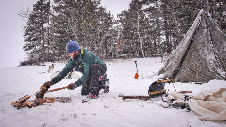 Dan chops firewood in the BWCA.