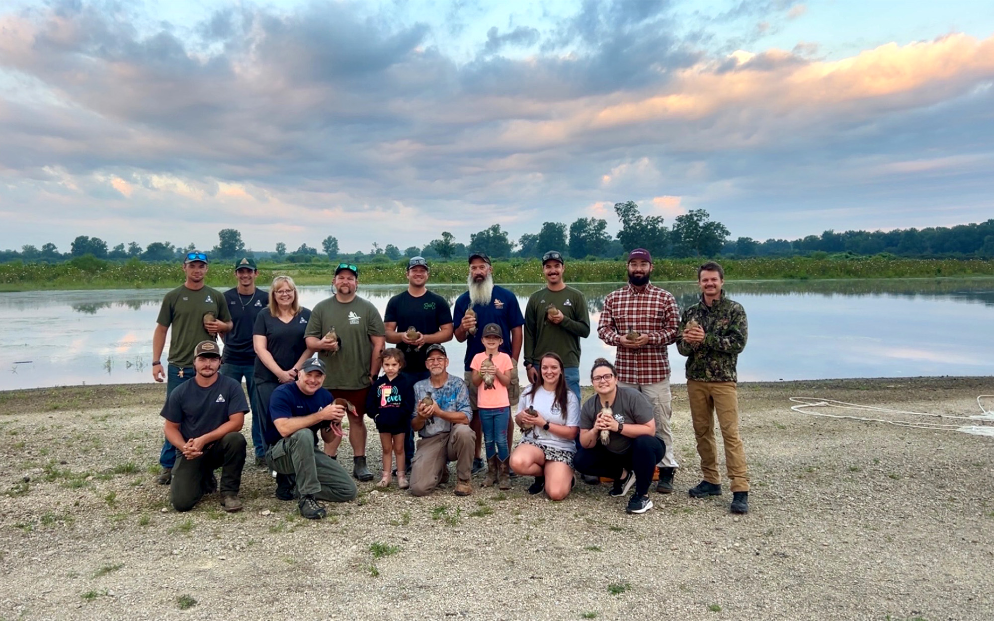 A group of duck hunters participating in a conservation project.
