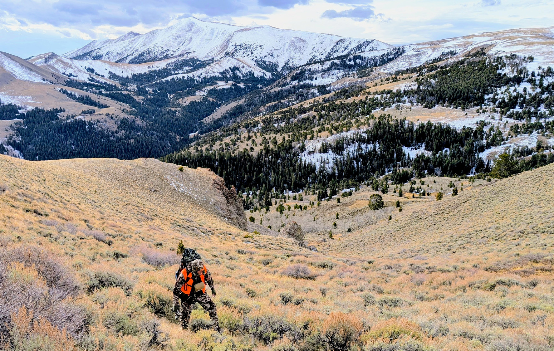 A hunter hikes on public land in Montana.