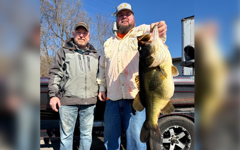 Tennessee anglers with a huge largemouth bass.