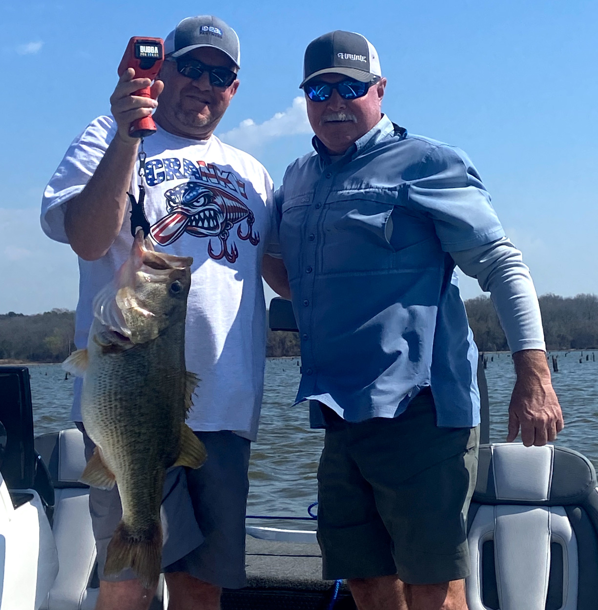 Two anglers with a big bass caught in Texas.