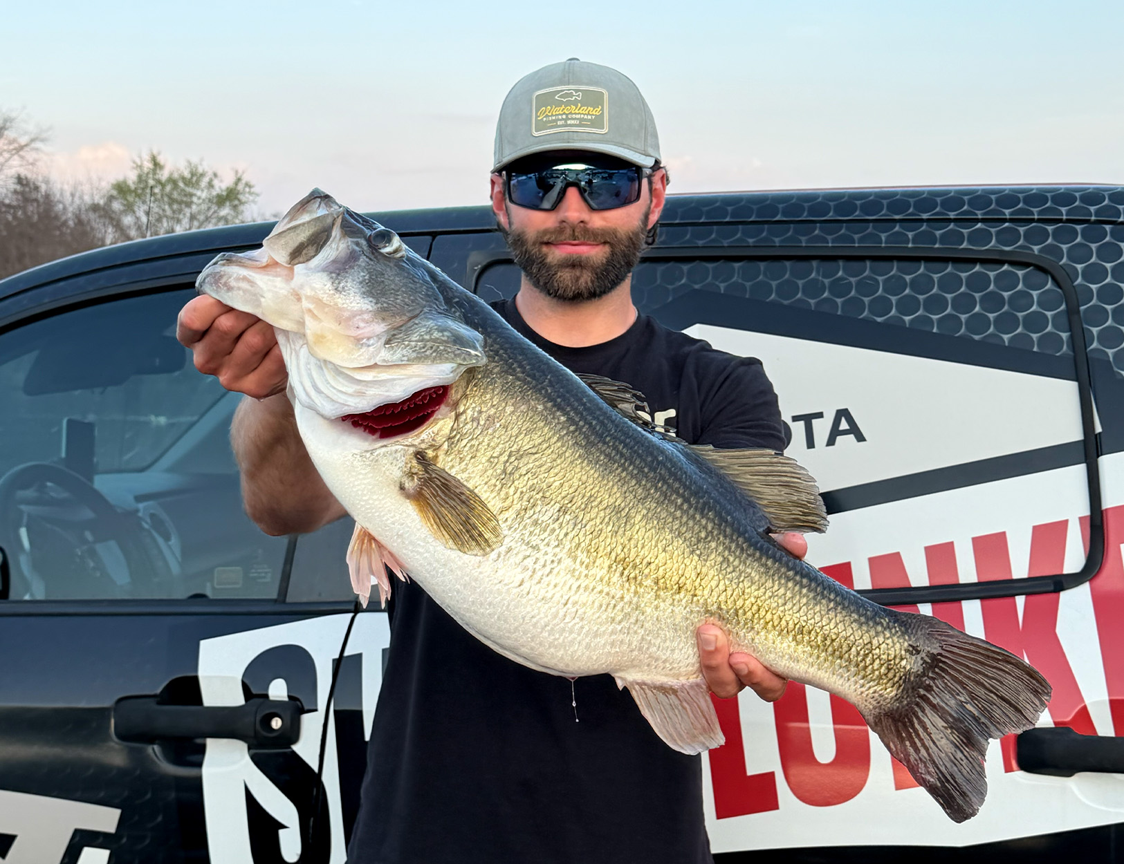 Bass Guide Lands a 13-Pound Largemouth on His First Time Fishing a
