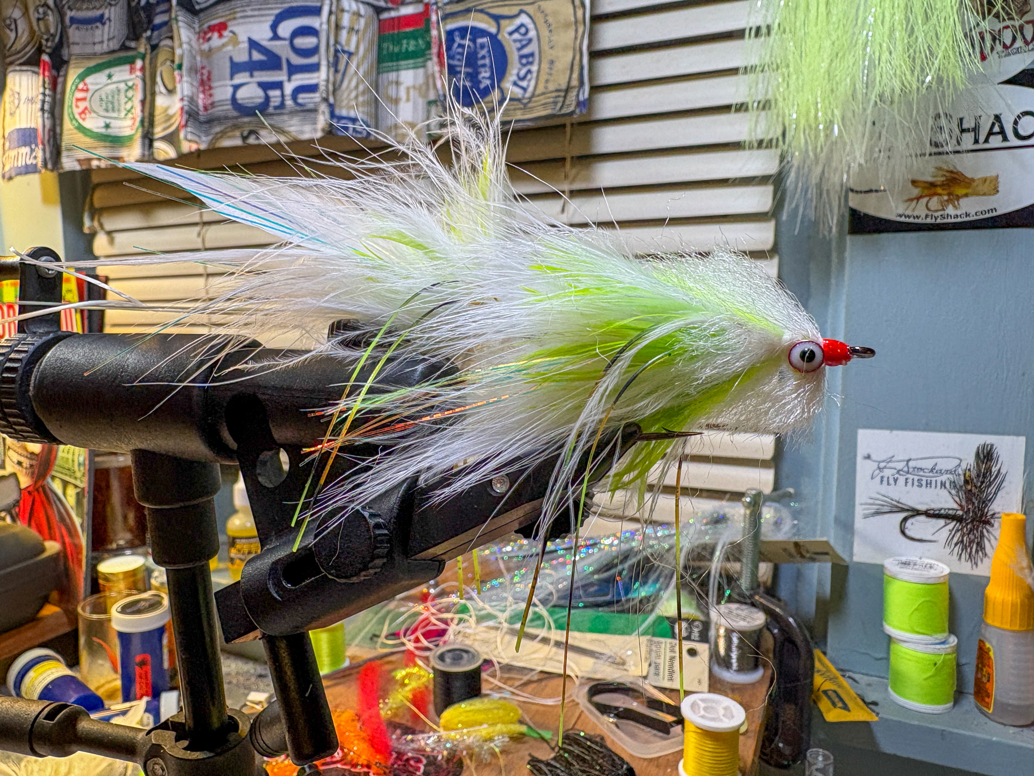 A big streamer in a fly tying vise.