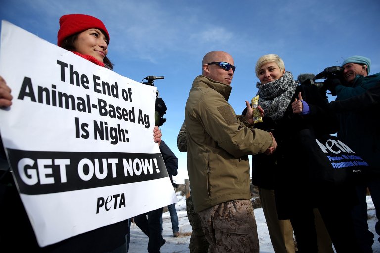 peta member protest animal-based ag in Oregon