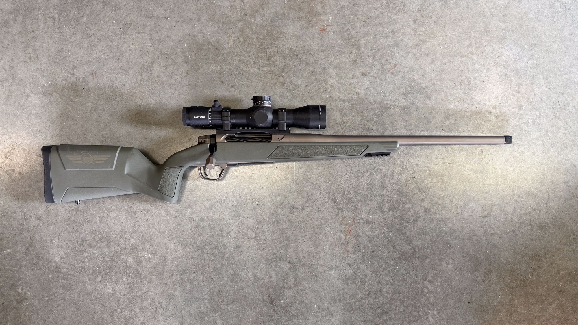 The Christensen Arms Evoke chambered in 25 Creedmoor photographed on concrete