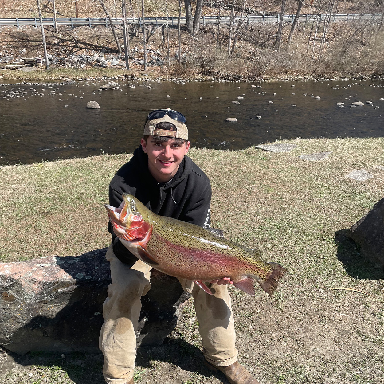 A Connecticut angler with a fat rainbow trout.