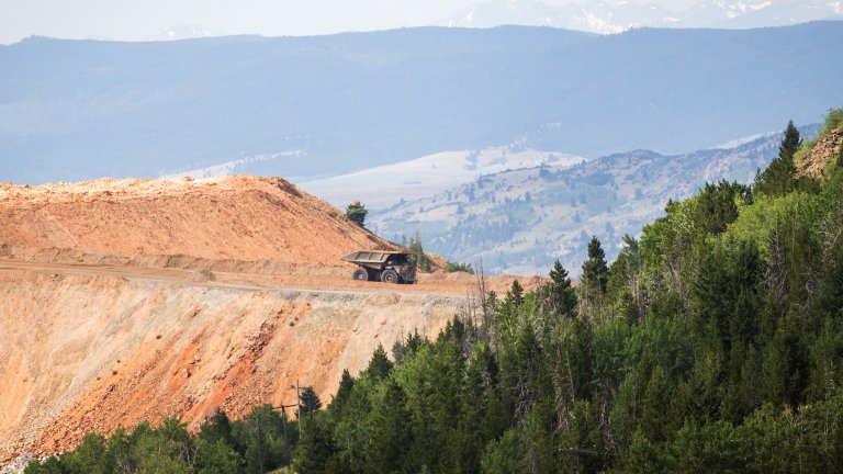 A mine adjacent to forest in Montana.