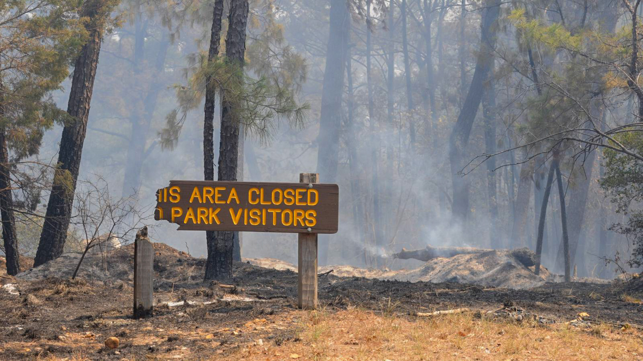 A burned sign during a fire.