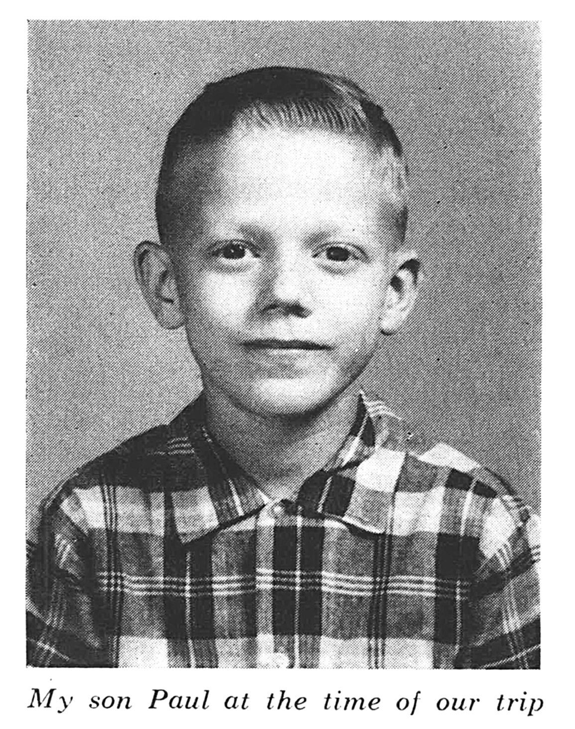 A black and white photo of a kid named Paul Guess
