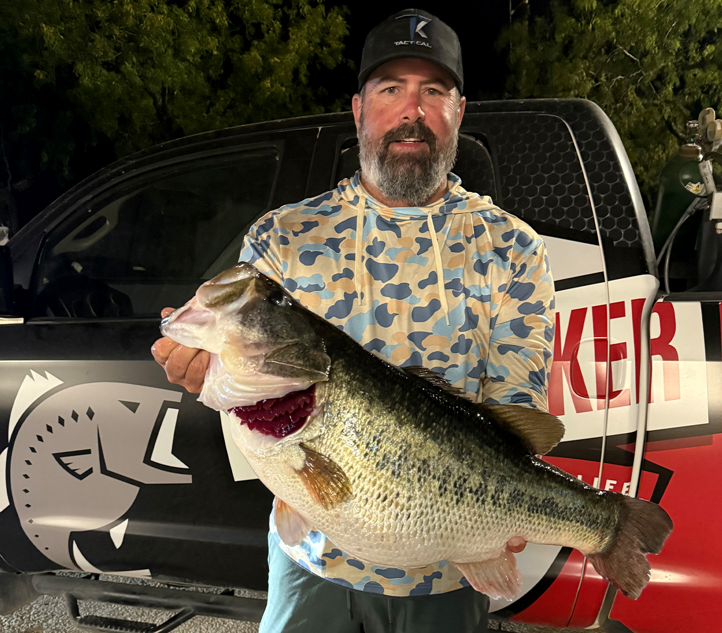 A bass angler with a trophy fish caught in Texas.