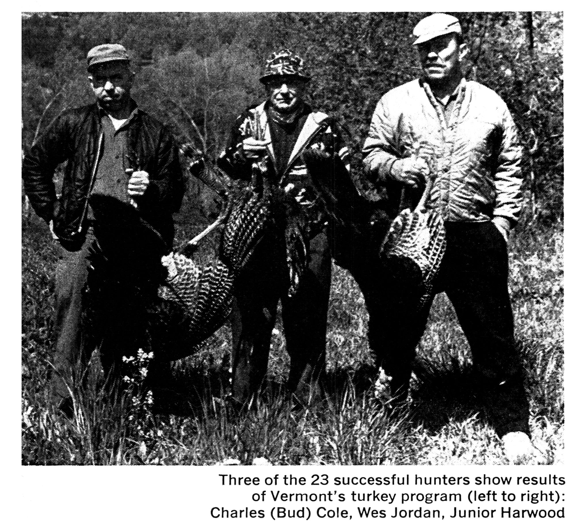 A black and white photo of three hunters.