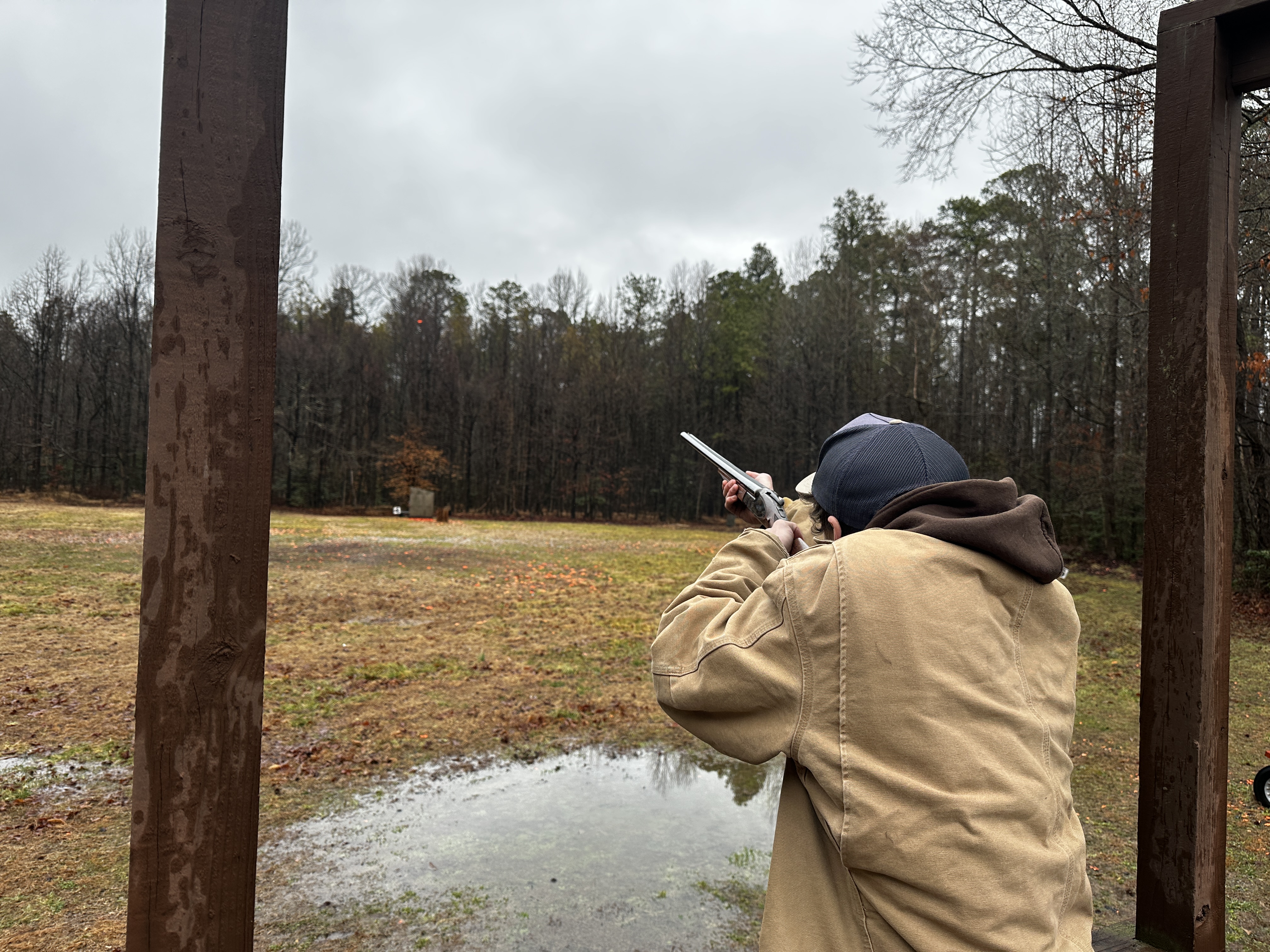 Testing side-by-side shotguns while shooting five stand.
