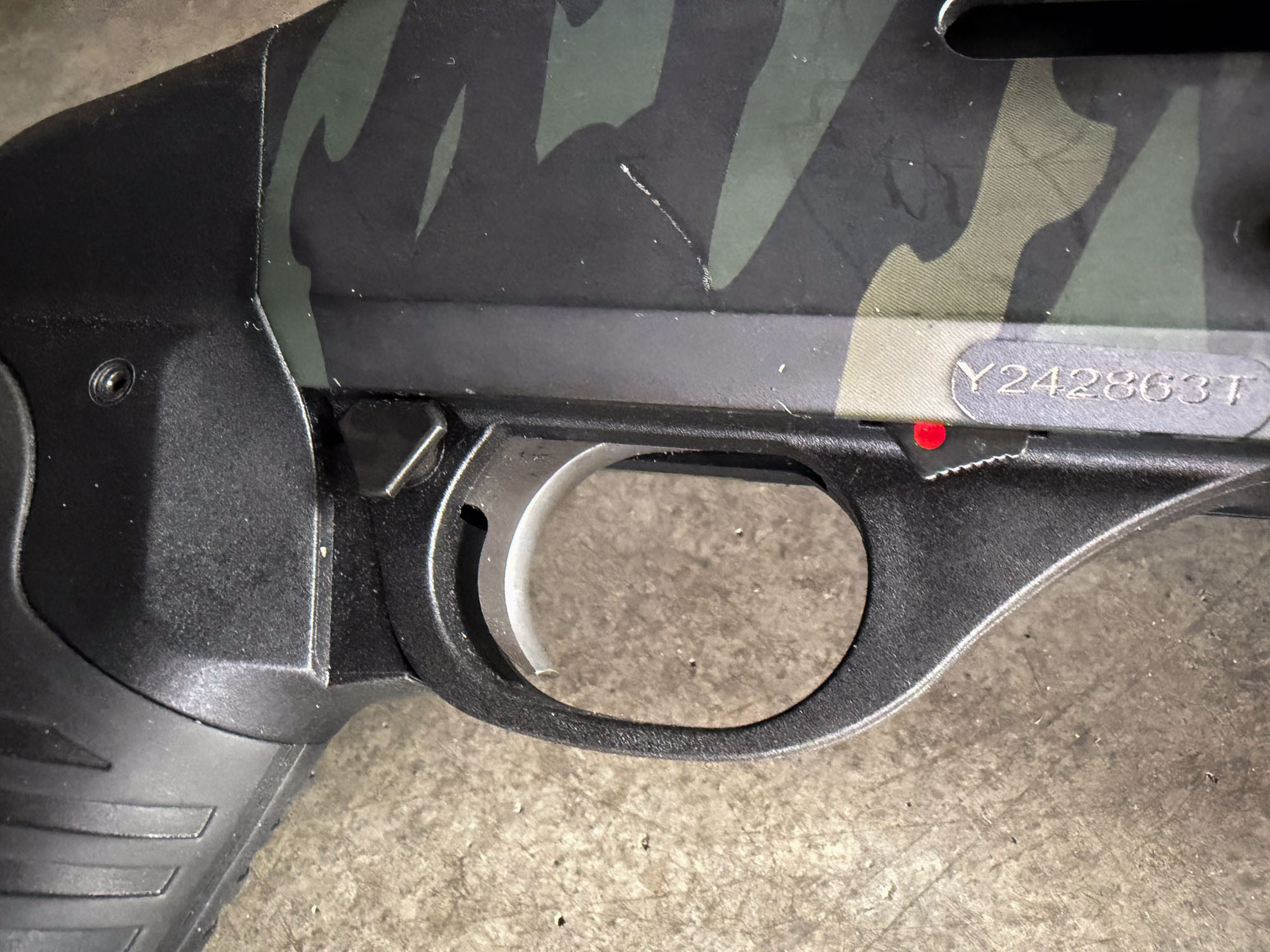 close up of Benelli M4 EXT trigger