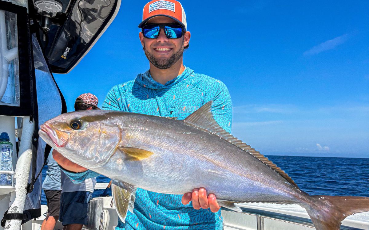 The author holding his first amberjack of the day