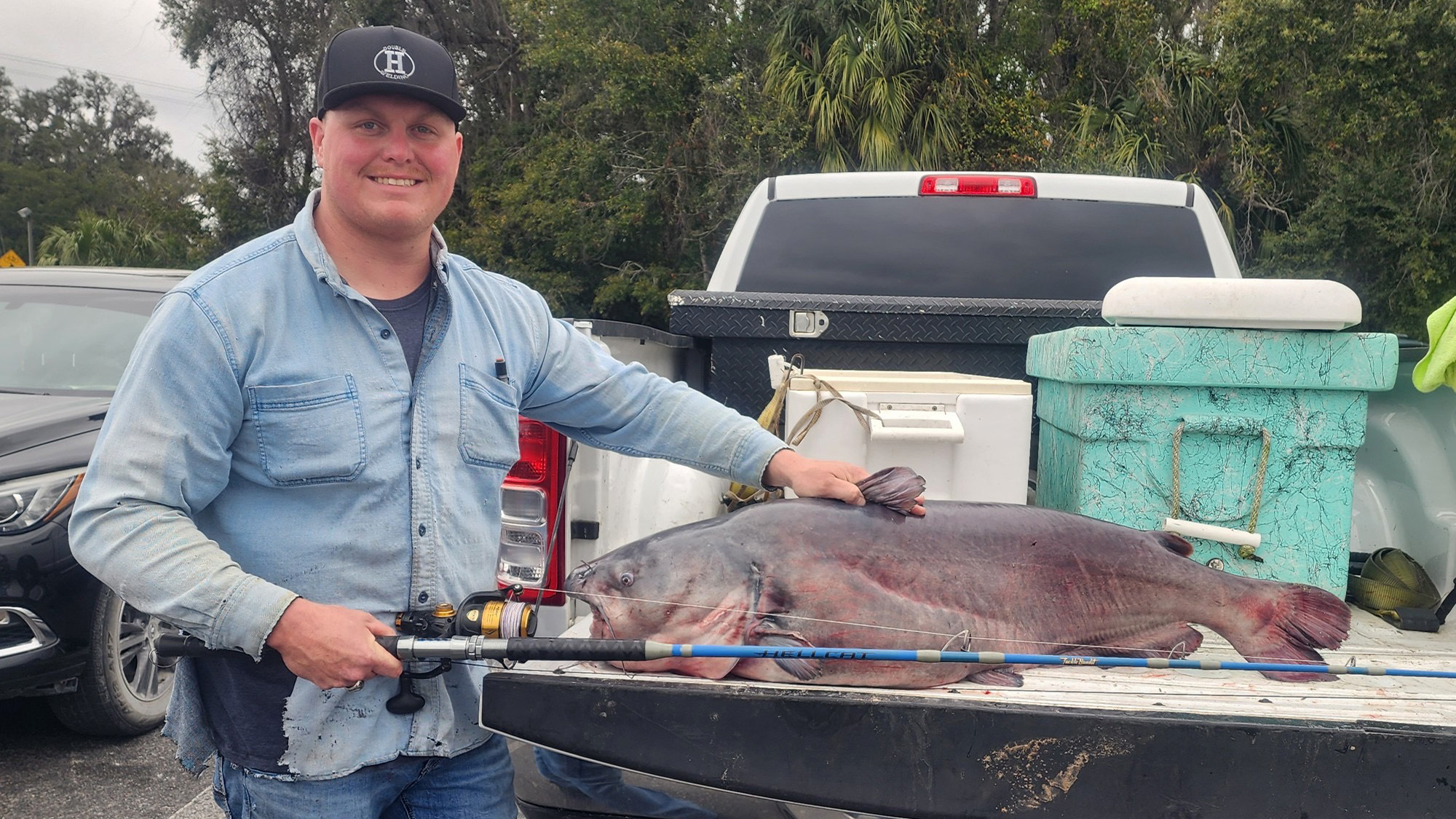 A Florida fisherman with a state-record blue cat.