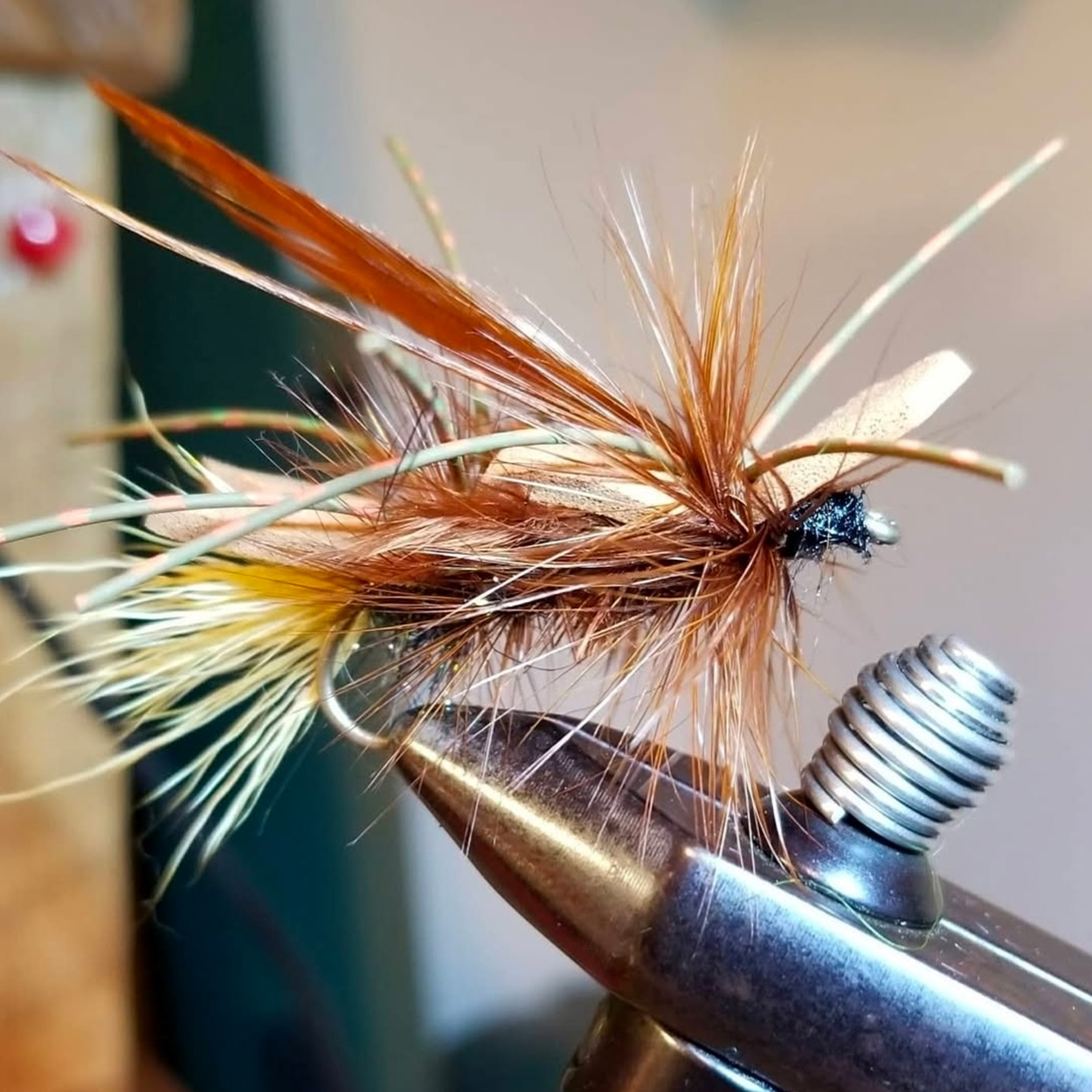 A hand-tied dry fly.