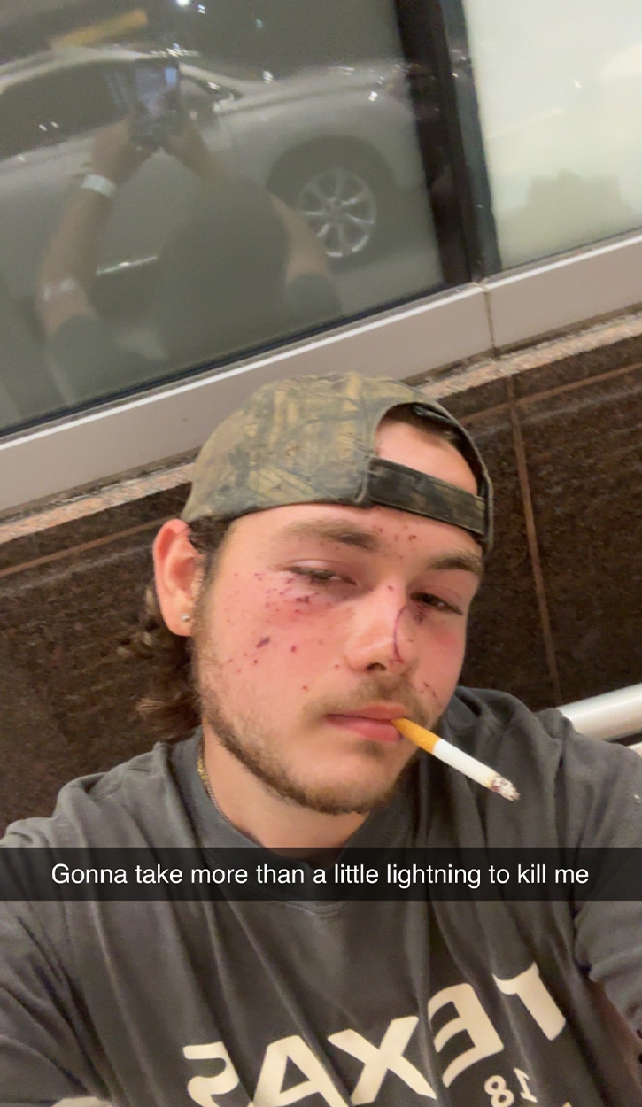 An angler takes a selfie on a hospital bench.