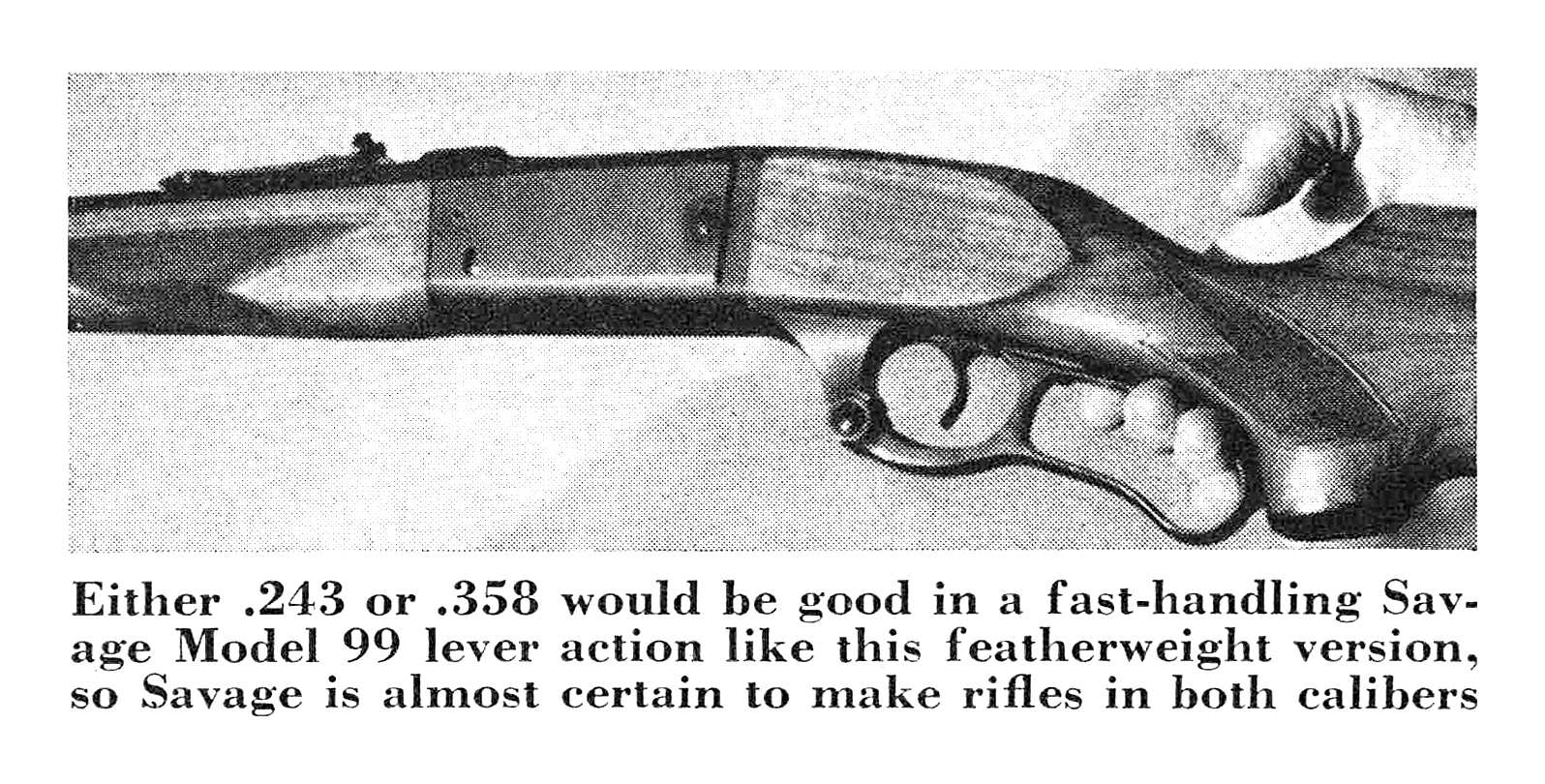 A black and white photo of a lever action rifle
