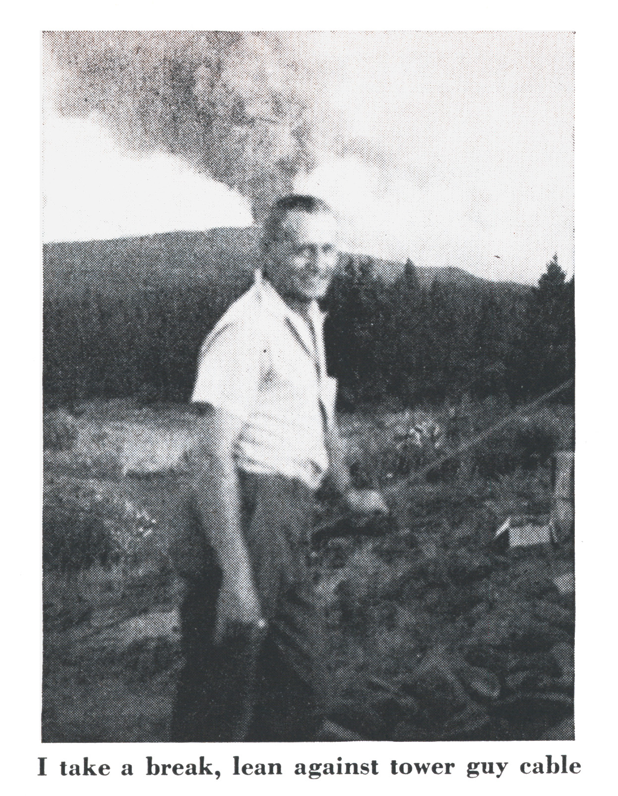 An old black and white photograph of a firetower lookout on break.